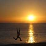 jumping person in sunset